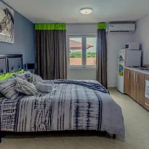 https://omira-apartment-suites.comcaribbean.com